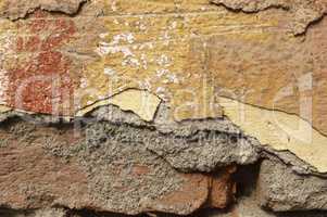 Close up of crumbling  wall with layers of peeled paint 2