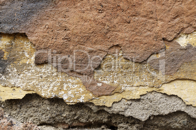 Close up of crumbling  wall with layers of peeled paint 7
