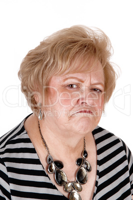 Angry older woman in portrait.