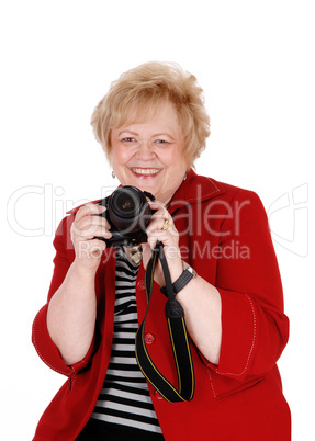 Happy grandmother taking pictures.