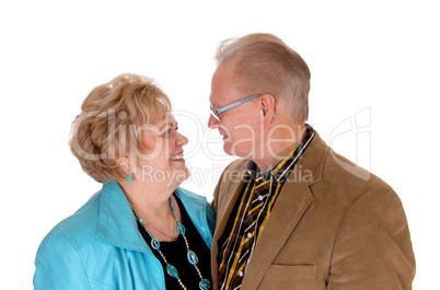 Senior couple looking at each other.