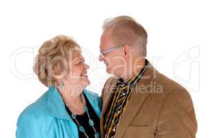 Senior couple looking at each other.