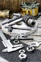 Caliper,nut,key and tools for threading