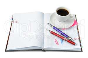 stationery and cup of coffee isolated on white background