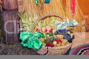 Fruits and vegetables in wicker basket sold at the fair.