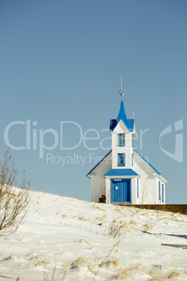 Blue and white church at the countryside, North Iceland