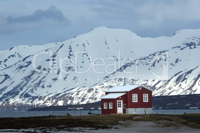 Red house at the fjords of North Iceland