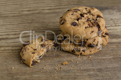 Brown cookies on wooden background