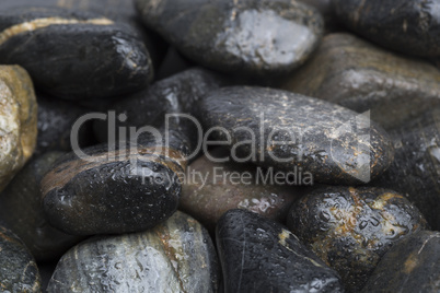 Dark and wet stones for background