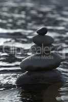 Stacked stones in water