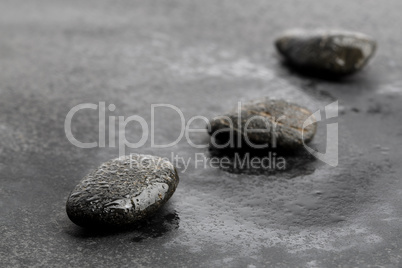 Dark and wet stones for background