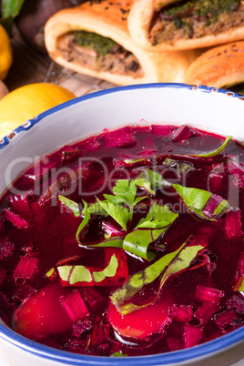 beet green soup with pastries