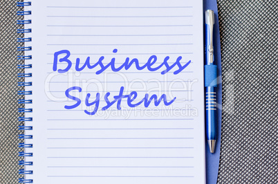 Business system write on notebook