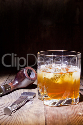 Tobacco pipe and whiskey