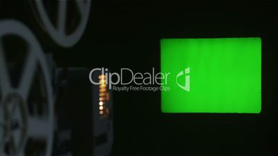 Movie projector displays a green screen