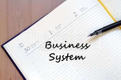 Business system write on notebook