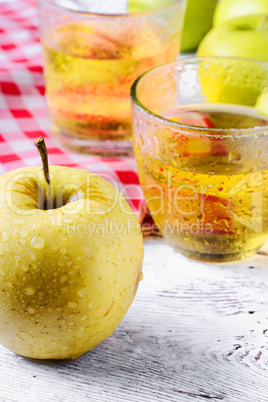 apple and glass of juice