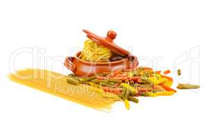 pasta and a clay pot isolated on white background