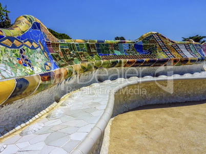 Ceramic bench at the Parc Guell designed by Antoni Gaudi, Barcelona, Spain.