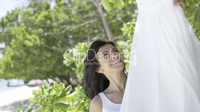 Happy woman on the beach.