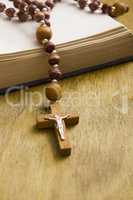 Catholic cross on the book