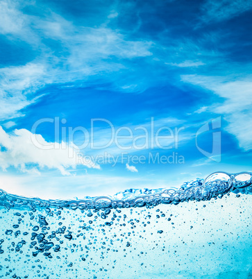 Close up water on a background of blue sky