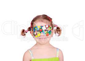 happy little girl with colorful party mask