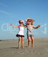 two little girl jumping