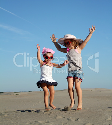 two little girl fun and jumping