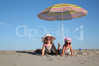 two little girl on the beach