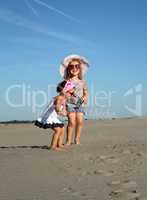 two happy little girl with sunglasses