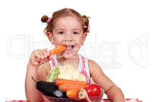 little girl eat carrot