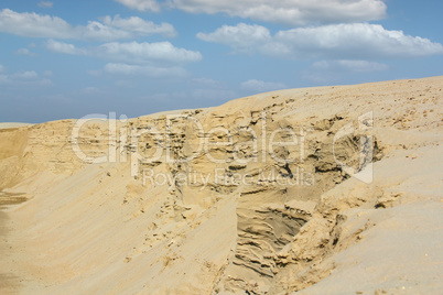 desert with sandy hills and blue sky