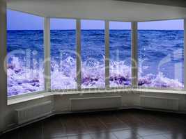 window with view of marine waves