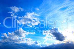 picturesque white clouds on blue sky