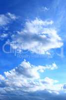 picturesque white clouds on blue sky