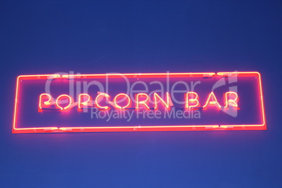 inscription popcorn made from red neon lights