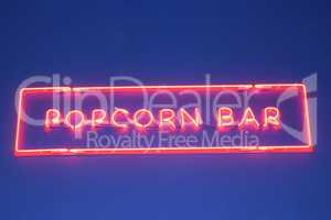 inscription popcorn made from red neon lights