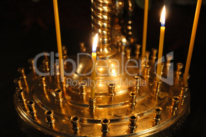 church candles brightly burning