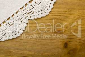White decorative lace on the wooden table
