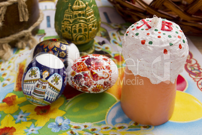 Colored Easter eggs and festive candles