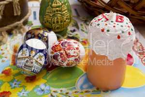 Colored Easter eggs and festive candles