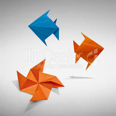 Group of swimming fishs in Origami