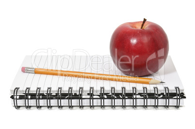 Notebook and apple