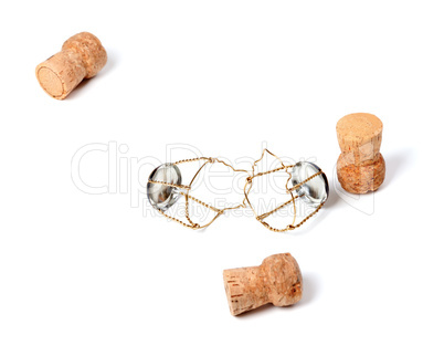 Three corks from champagne wine and muselets
