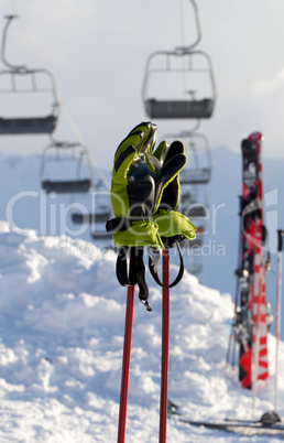 Gloves on ski poles at ski resort