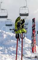 Gloves on ski poles at ski resort