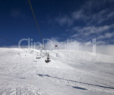 Gondola and chair lift at ski resort in nice day