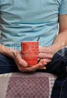 Man holding a cup of coffee