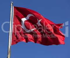 Turkish flag waving in wind at sunny day